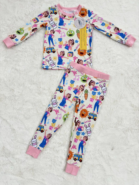 Children's pajama set with colorful cartoon characters on a white background